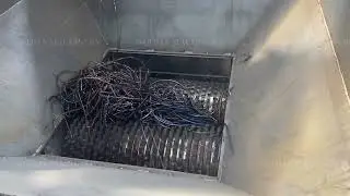 Scrap metal shredder