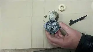 The generator won't start. We clean the carburetor.