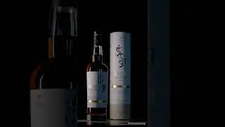 The play of light and shadow upon the Indri bottle.