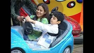 Darsheel Safari driving a go-cart and playing at a shopping mall