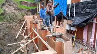 Veterans concrete,..load / vibrate concrete @ retaining wall