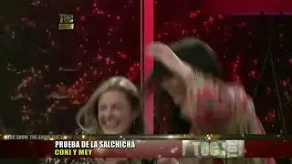 A well-known Cuban TV Show Host, Mey Santamaria, playing card kissing game with another lady_qvgHqk