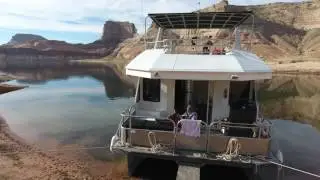 Lake Powell Epic Padre Cliff Dive pan to Boat