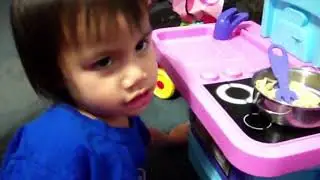 Hannah pretend play cooking