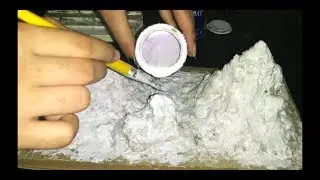 Making a mountain model with waste cardboard and thermocol