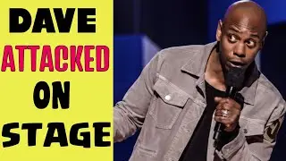 Comedian Dave chappelle attacked on stage by armed hater with gun