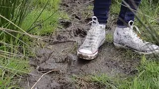 White Converse muddy