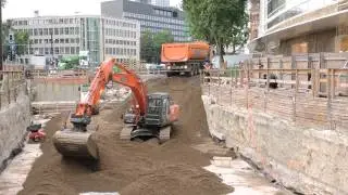 Excavator an truck huge construction site