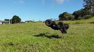 MJX Hyper GO 14210 brushless in short grass