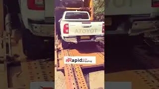 Uploading Toyota Hilux: See How We Handle Enclosed Car Shipping!