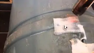 How to mend a water butt crack or hole using a milk carton