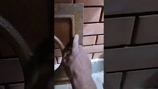 Installing a cast iron stovetop under a brick cauldron