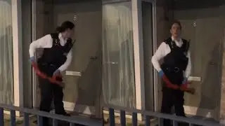 Cop Tries Breaking Into Home