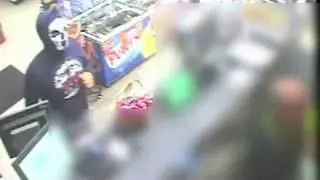 Man in skull mask and armed with scalpel robs petrol station