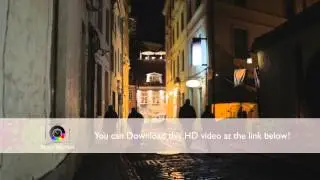 Old city at night. Silhouettes of people.