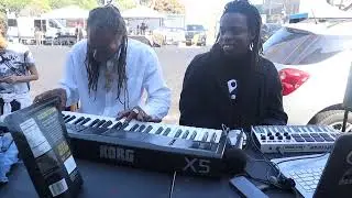 Clocksyn and Osiris practicing piano in Leimert Park