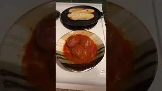 "Meatball Mania: My Delicious Parmesan Hero on Garlic Bread"