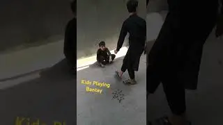 Kids Playing Bantay in Street