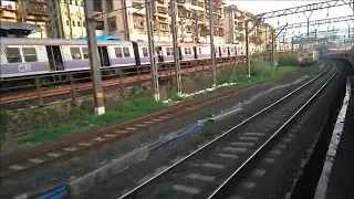 Parallel overtake and re-overtake || Mandovi Express through the busiest Mumbai local train stretch.