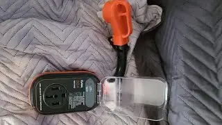 unboxing an RV surge protector.