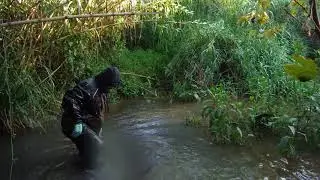 Adidas rain jacket in muddy creek 3