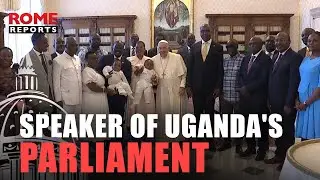 Speaker of Uganda's Parliament greets the Pope alongside 24 family members