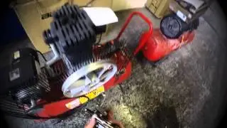 How to remove a belt pulley wheel from an air compressor
