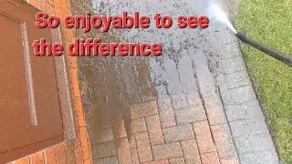 Filthy driveway jet washed power cleaned