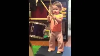 Emi on drums