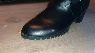 Crush bread with dirty Black boots