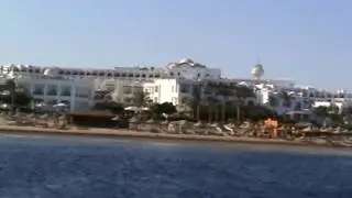 The Red sea, beach, boat with a transparent bottom/Красное море, пляж, лодка с прозрачным дном