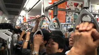 On the Yamanote Line, rush hour in Tokyo.