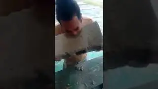 MAN EATS CLIND BLOCK