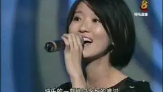 Joi Chua singing 庆幸有你爱我