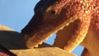 A Big Dinosaur Destroys a Building