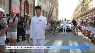 Джин с факелом Олимпийского огня
