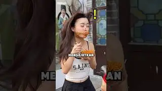 The girl was eating when a strong wind blew