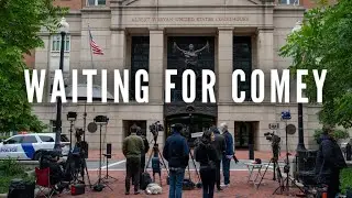 Standing in the rain waiting for James Comey.