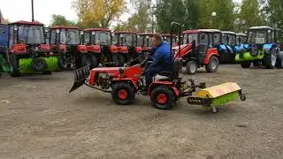 МТЗ 132 н Беларус с отвалом и щёткой