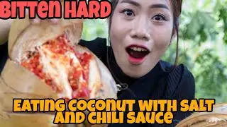 Eating Coconut with Salt and Chili Sauce