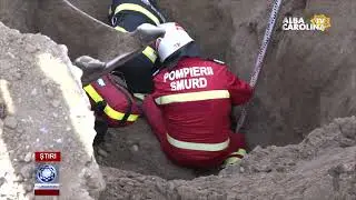 Bărbat prins sub un mal de pământ