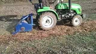 измельчаю скошенную Малину мульчером .