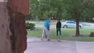 Armed man scares off robbery suspect outside his home
