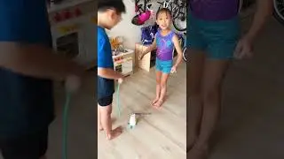 A fun indoor paper cup game that's perfect for siblings to play together!