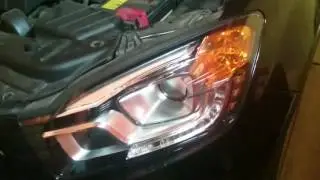 Replacing the low beam headlight bulb on a SY Actyon New facelift