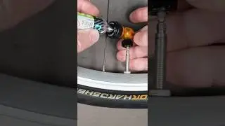 Using a CO2 Inflator to instantly inflate a bike tire