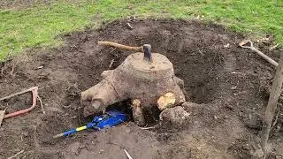 Removing a Large Tree Stump using a Car Jack, Axe & Saw.