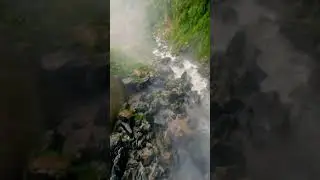 FPV Drone diving done a Waterfall