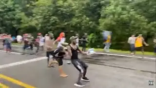 Caravan throws rocks at National Guard