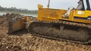 Powerful Bulldozer KOMATSU D41P pushing dirt - Cambodia